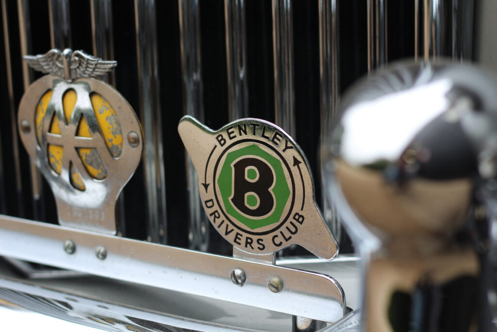 classic bentley drivers club badge on bentley grill