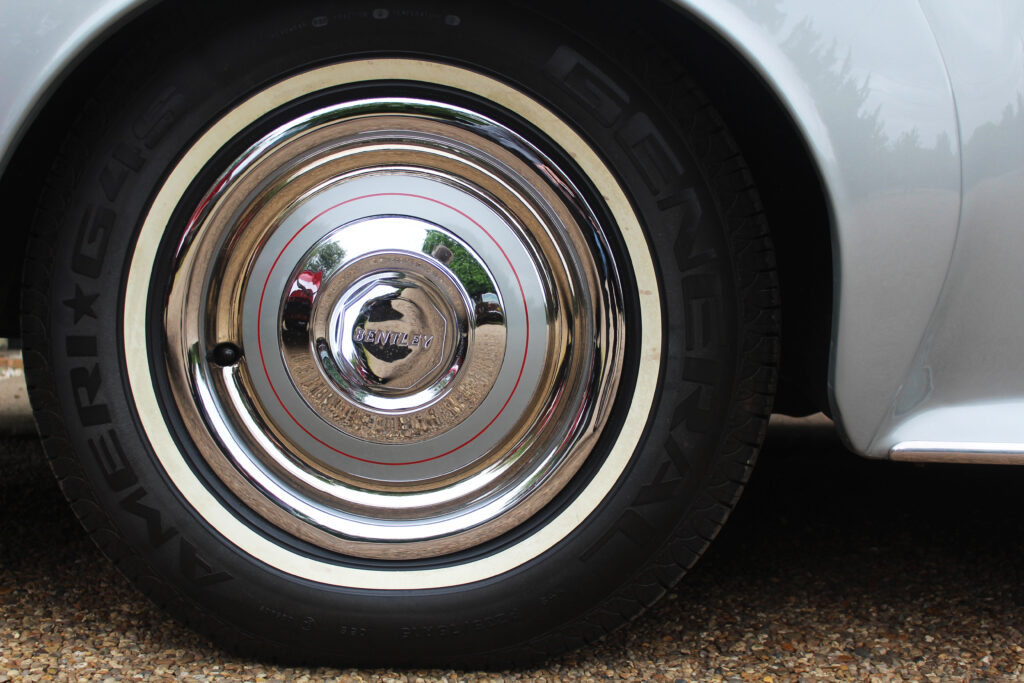 close up of Bentley S1wheel details. car is silver.