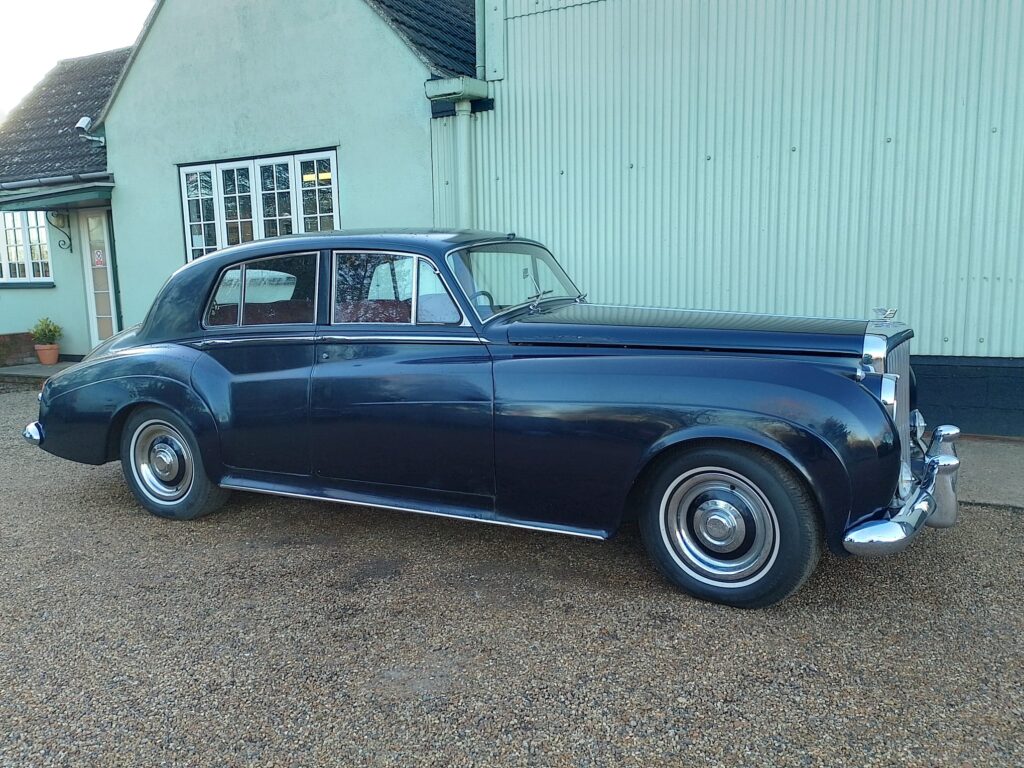Black Bentley S1. Sideview, parked outside the Harvey Wash Ltd workshop