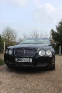 front view of black Bentley GTC